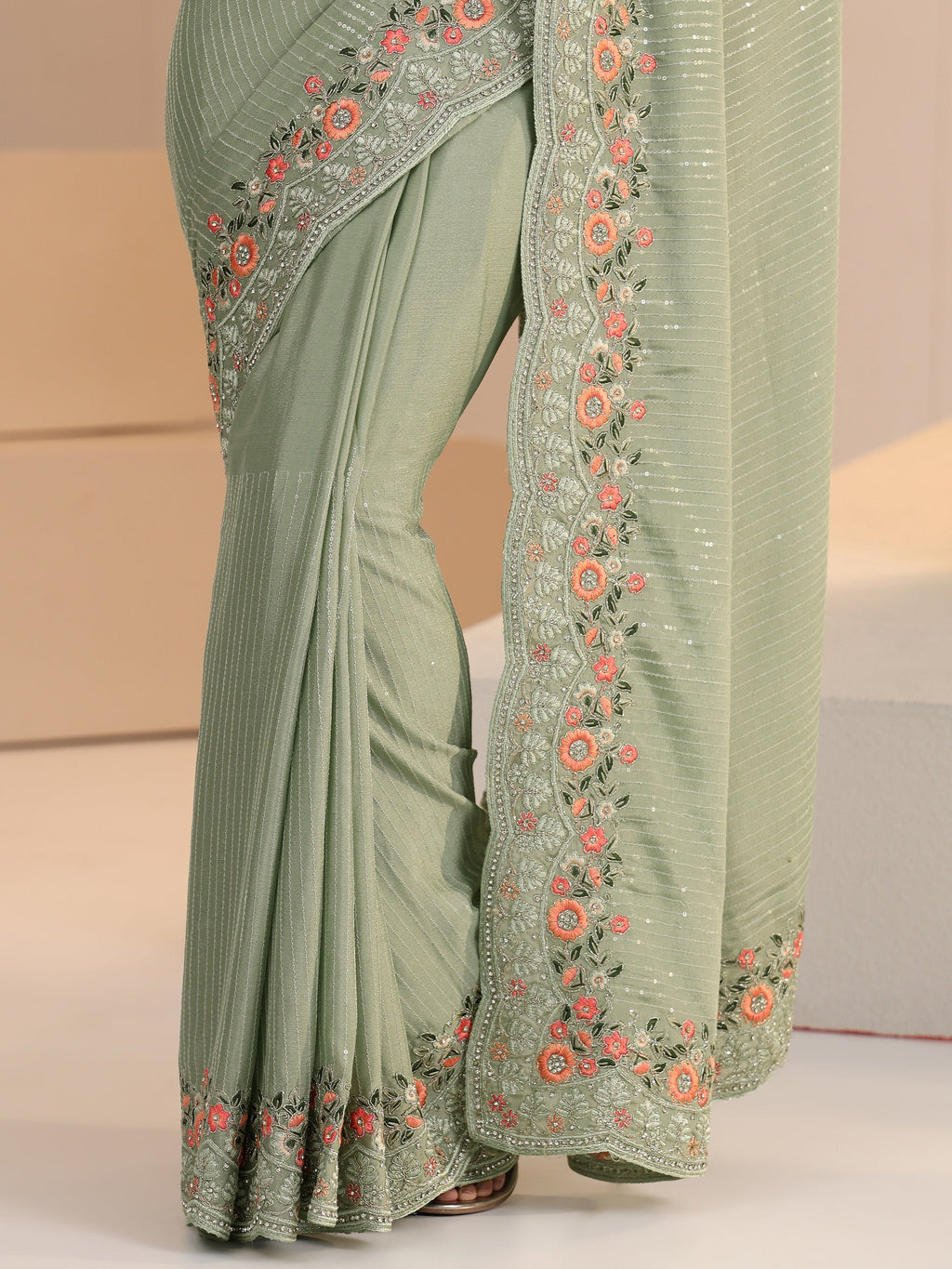 Libas Pista Green Striped Embellished Chiffon Saree with Floral Border