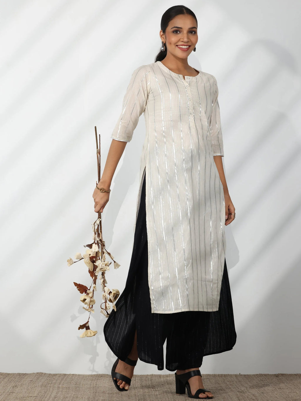 Libas Black Self Design Rayon Palazzos